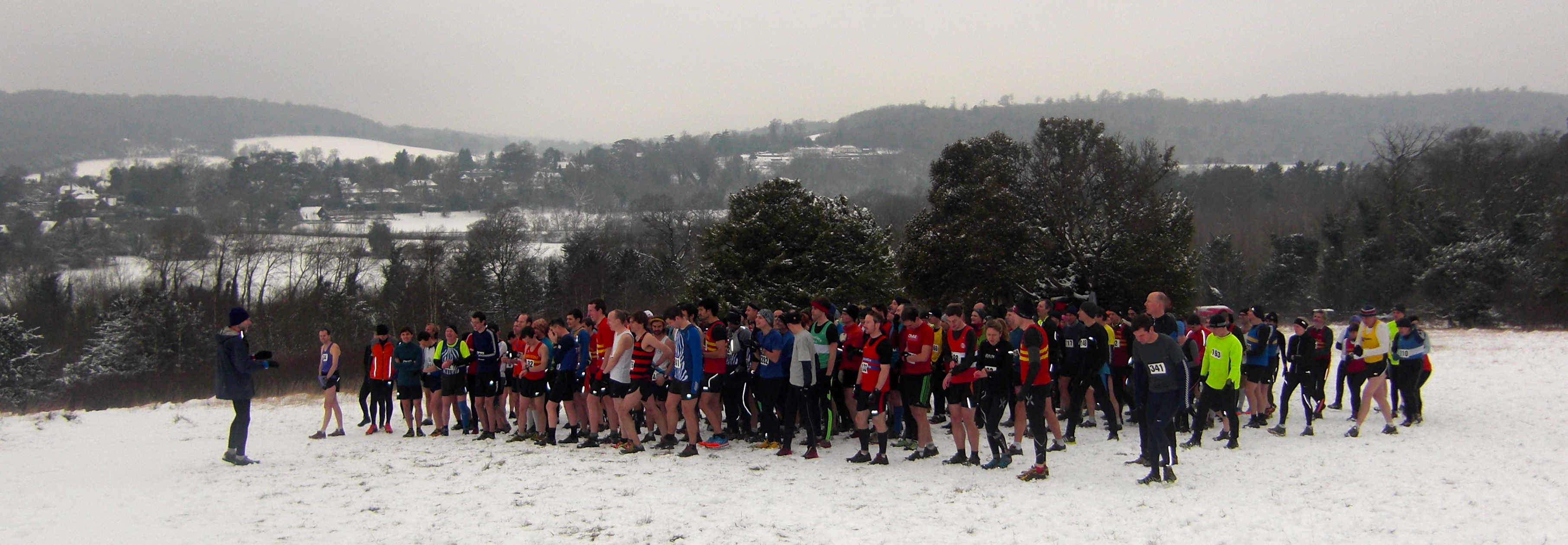 Runners gather on the snowy start line for the 32nd Box Hill Fell Race